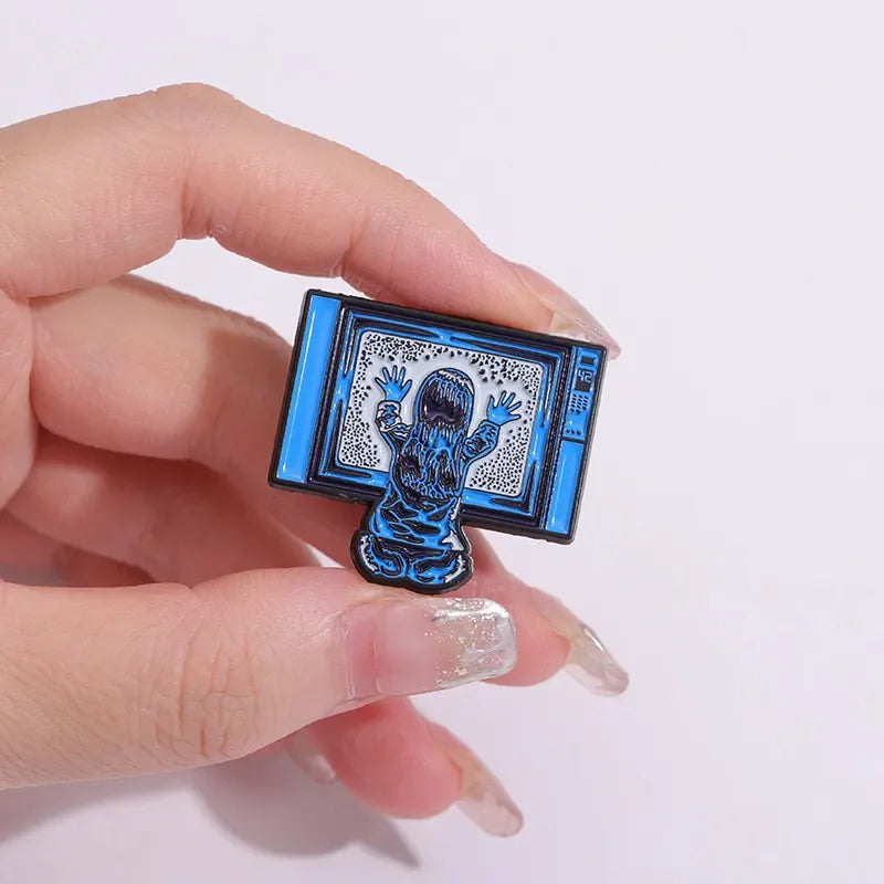 Poltergeist Enamel Pin